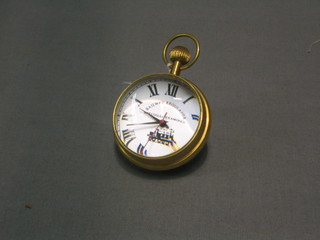 An Indian reproduction brass cased paperweight clock