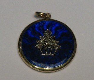 A gold and blue enamel locket set diamonds