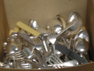 A collection of silver plated flatware