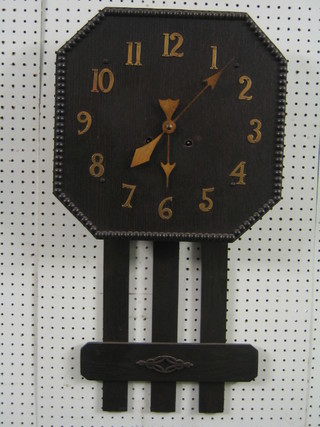 A Voisy style wall clock with octagonal wooden dial contained in an oak case