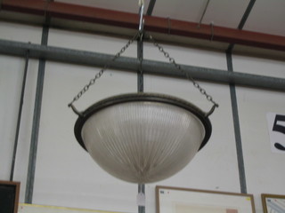 A circular Art Deco glass and bronzed dome shaped light shade