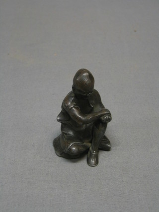 A 19th Century Oriental lead and bronze figure of a seated gentleman  2 1/2" (old break to leg F and R)