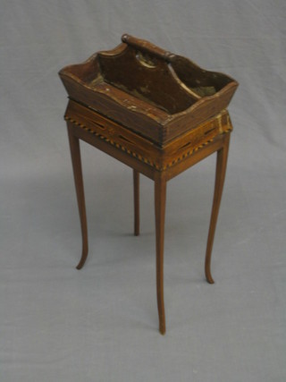 A 19th Century inlaid marquetry rectangular twin section cutlery box, the base fitted a drawer, raised on an associated stand and cabriole supports 13"