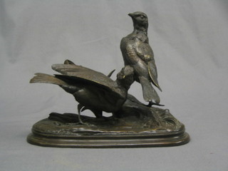 P J Maignuag, a bronze figure of 2 standing birds, raised on an oval naturalistic base 10" (standing bird f and r)
