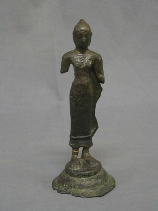 An Eastern bronze figure of a standing Deity 7"