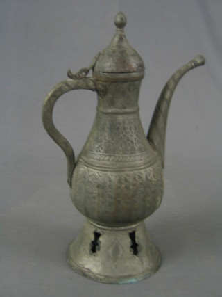 An Eastern waisted metal engraved coffee pot 18"