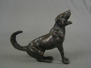 A leather covered figure of a seated growling dog 11"