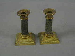 A pair of Victorian granite and brass candlesticks 5 1/2"