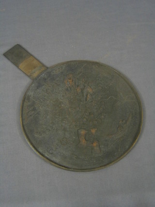 An Eastern bronze hand mirror 10"