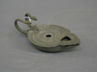 A 19th Century patented Egyptian style metal oil lamp