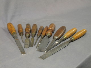 An oil stone and 14 various chisels