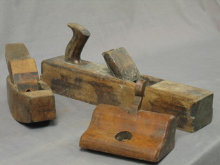 A large wooden jack plane, 2 smoothing planes, a brace, various bits etc