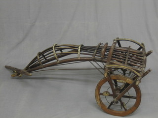 A 20th Century Eastern wheeled dog cart 51"