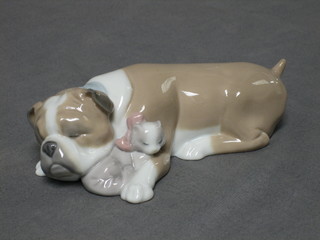 A Lladro figure Unlikely Friends of sleeping dog and cat, base impressed 6417 6"
