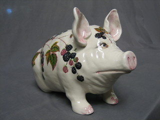 A "Weymss" figure of a seated pig decorated blackberries, the base marked Weymssware Exon 2485 D Adams 17"