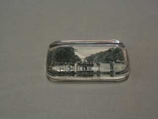 A rectangular glass paperweight the back decorated a black and white photograph of Rotton Row Carriage Drive  and another Seaside Resort