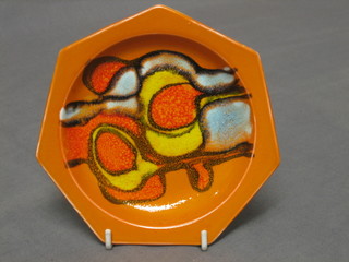 A Poole Pottery Atomic orange circular shaped dish, base marked Poole England 32, 6"