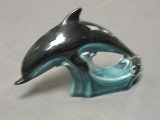 A Poole Pottery figure of a diving dolphin 7"