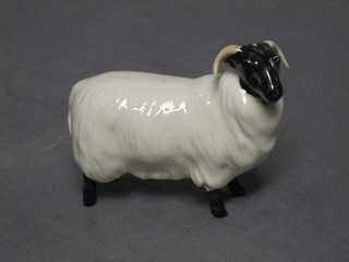 A Beswick figure of a standing ram 3"