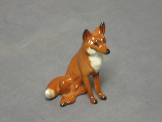 A Beswick figure of a standing fox 2"