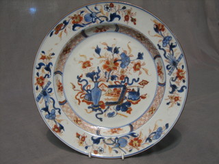 An 18th Century Japanese Imari porcelain plate decorated flowers 11" (very slight chip to rim)