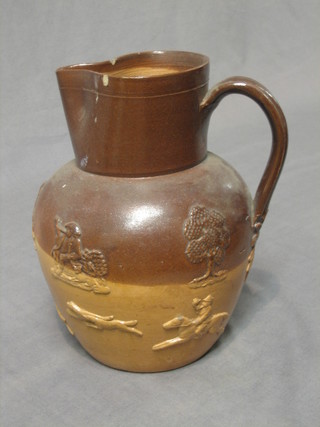A brown glazed Harvest ware jug 9" (chips to rim)