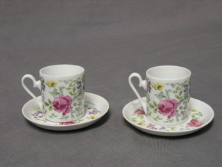A set of 7 coffee cans and saucers with floral decoration