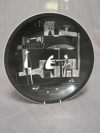 A Polish Picasso style plate decorated cafe scene with figures, the base marked Chodziei Made in Poland, hand painted 4888F, 13"