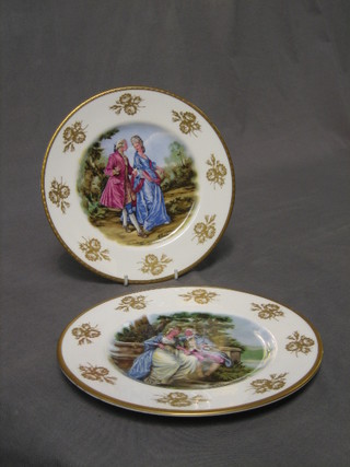 A pair of Minton Golden Heritage plates decorated Romantic scenes 10"