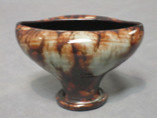 A Ewenny pottery boat shaped brown and grey glazed vase, raised on a circular base 6"