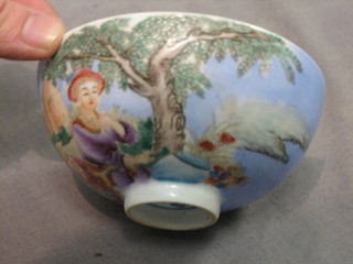 An Oriental circular bowl decorated figures by a tree, base with 6 character mark 4"