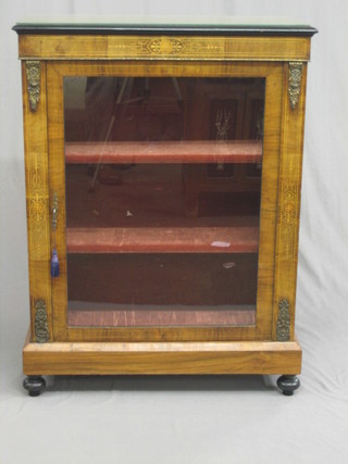 A Victorian inlaid walnut Pier cabinet with gilt metal mounts, the shelved interior enclosed by a glazed panelled door 32"