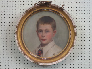 A head and shoulders portrait of a "Young Boy" monogrammed and dated 1908 13" circular