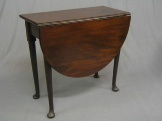A Georgian mahogany oval single drop flap occasional table, raised on club supports 30", (the top with old patch mark)