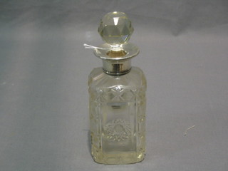 A square cut glass scent bottle with silver collar, London 1926 6"
