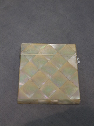 A Victorian engraved mother of pearl card case 4"