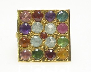 A lady's gold dress ring set numerous semi-precious stones