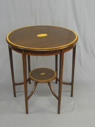 An Edwardian circular inlaid mahogany 2 tier occasional table raised on square supports 27"
