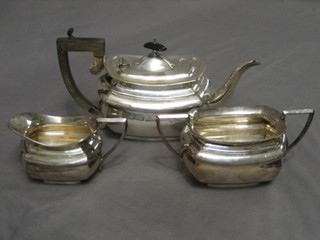 A Georgian style 3 piece tea service of cushion form comprising teapot, twin handled sugar bowl and cream jug