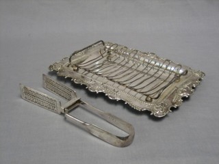 A rectangular embossed silver plated asparagus tray and matching Old English pattern tongs