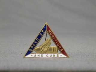 A WWI triangular enamelled badge "Speed Up Munitions and Guns, the reverse marked "Did Her Bit on Munitions Great War 1914-1918