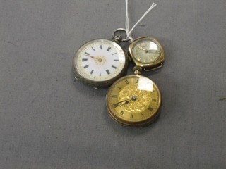 A lady's gold cased wristwatch, a fob watch contained in a gilt metal case and a silver open faced fob watch