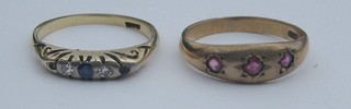 A  lady's gold dress ring set pink stones and 1 other set sapphires and small diamonds 