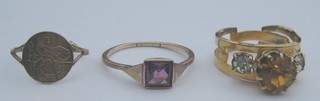 A lady's gold St Christopher ring and 2 gilt metal dress rings