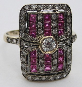 A lady's gold dress ring set 6 rows of 16 rubies supported by diamonds