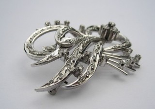 A lady's very attractive 18ct white gold spray brooch set numerous diamonds