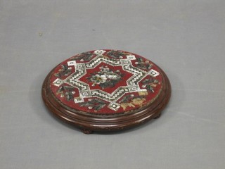 A Victorian circular mahogany and bead work teapot stand/footstool, 13"