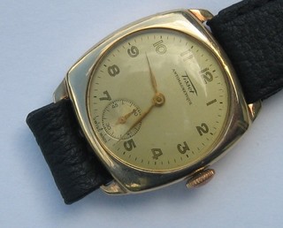 A gentleman's Tissot Antimagnetique wristwatch contained in a 9ct gold case