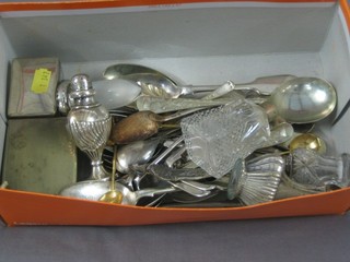 A pair of embossed silver plated peppers, 2 rectangular dressing table jars with silver plated lids, a small collection of flatware etc