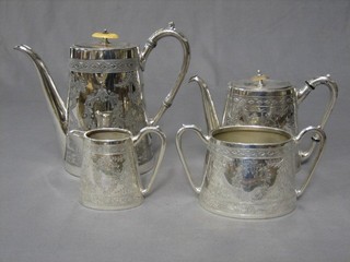A Britannia metal 4 piece tea/coffee service comprising teapot, coffee pot, twin handled sugar bowl and cream jug